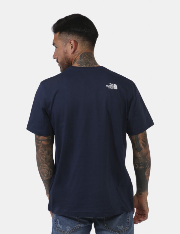 T-shirt The North Face Blu - T-shirt su base blu navy con stampa centrale logo brand sul fronte in bianco, più piccola stamp