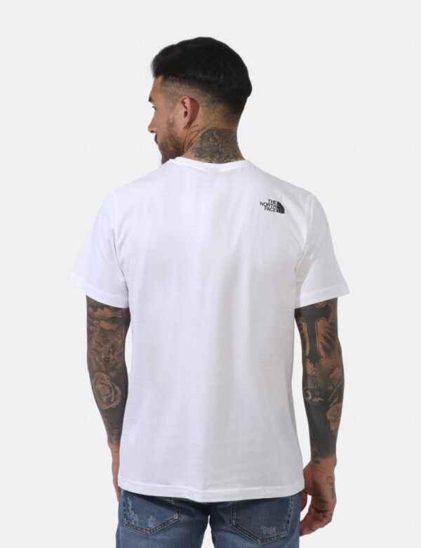 T-shirt The North Face Bianco - T-shirt su base bianca con piccola stampa logo brand sia sul fronte sia sul retro in nero. L