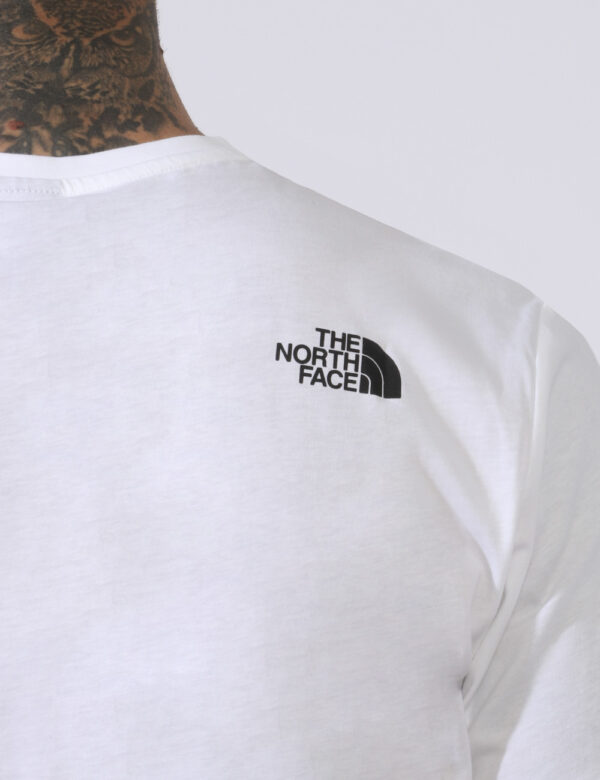 T-shirt The North Face Bianco - T-shirt su base bianca con piccola stampa logo brand sia sul fronte sia sul retro in nero. L