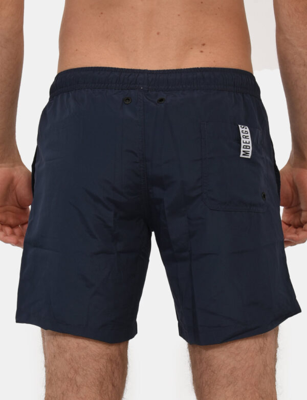 Costume Bikkembergs Blu - Costume modello shorts in 100% poliestere. Il capo si sviluppa in total blu navy con logo brand ro