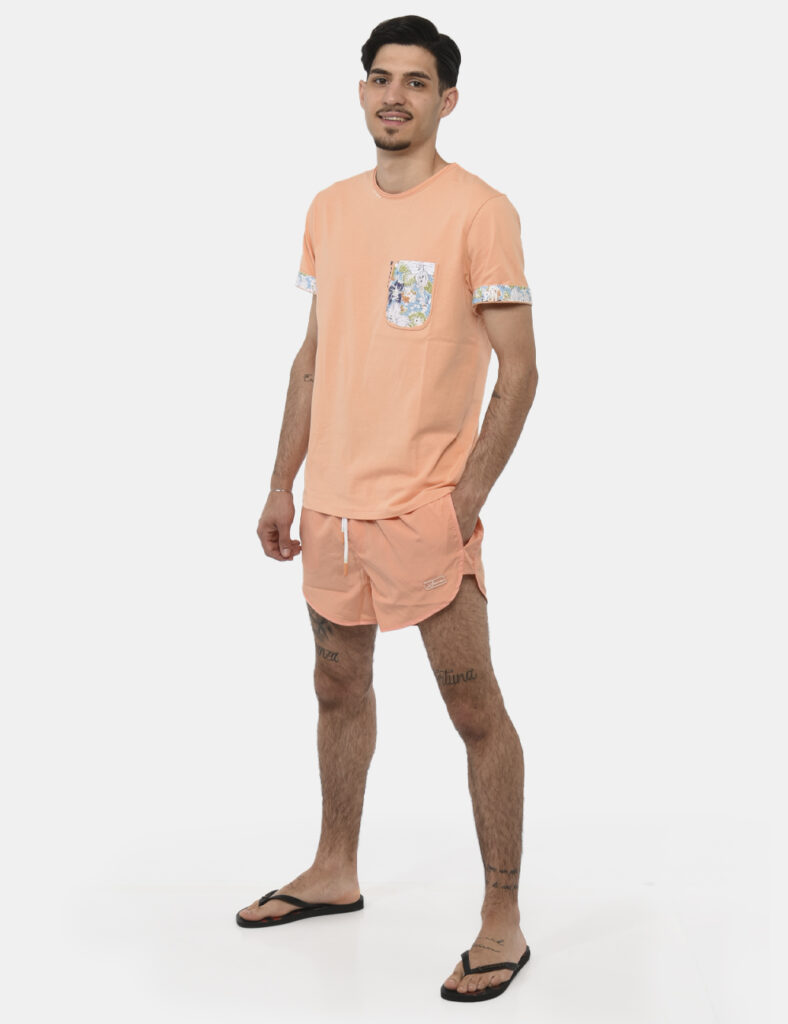 Costume Sseinse Arancione - Costume modello shorts in 100% poliestere. Il capo si sviluppa in total arancione pesca con tasc