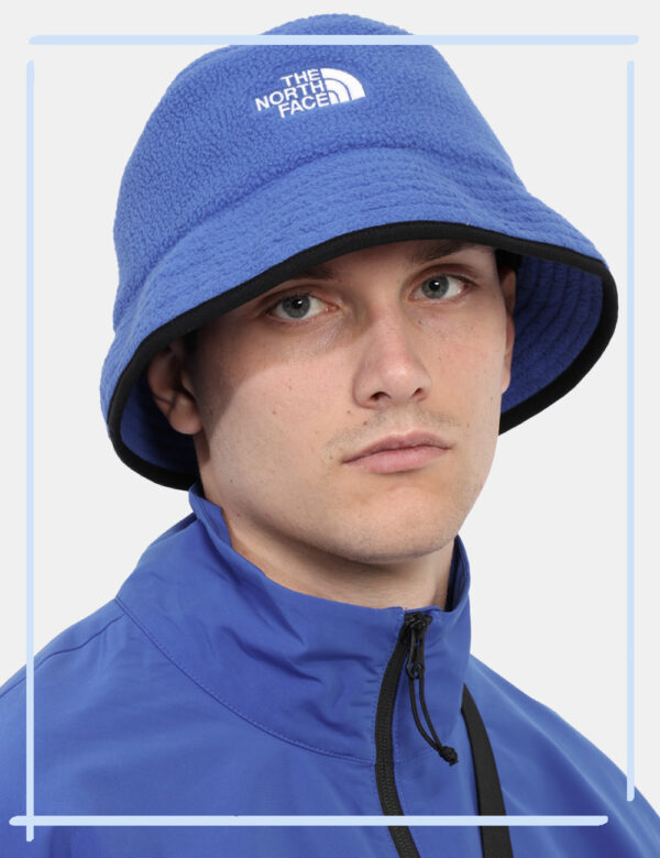 Cappello The North Face Blu - Bucket hat con logo TNF sul fronte ricamato con filo bianco. Indossa questo cappello blu elett