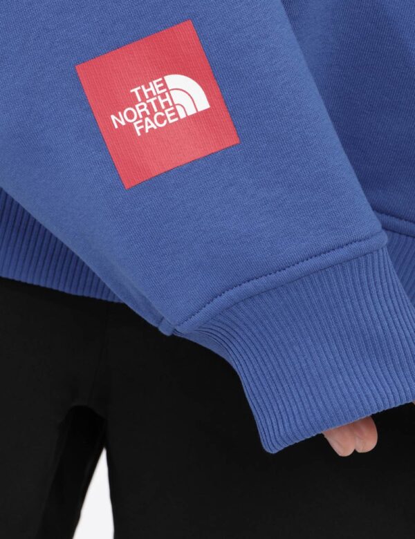 Felpa The North Face Blu - Felpa blu elettrico con dettagli rossi, presenta un cappuccio e tasca frontale. Il logo in vista