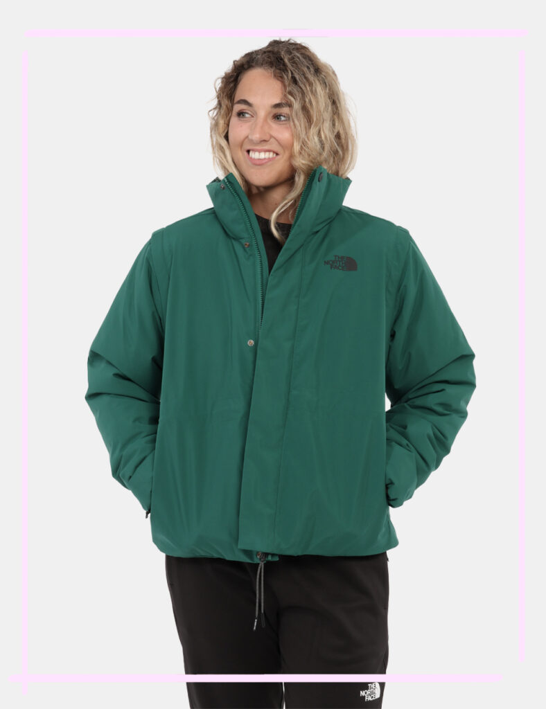 Piumino The North Face Verde - Piumnino verde bottiglia con cappuccio e zip sulle maniche. Togli le maniche e diventa un gil