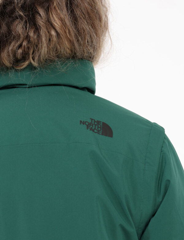 Piumino The North Face Verde - Piumnino verde bottiglia con cappuccio e zip sulle maniche. Togli le maniche e diventa un gil