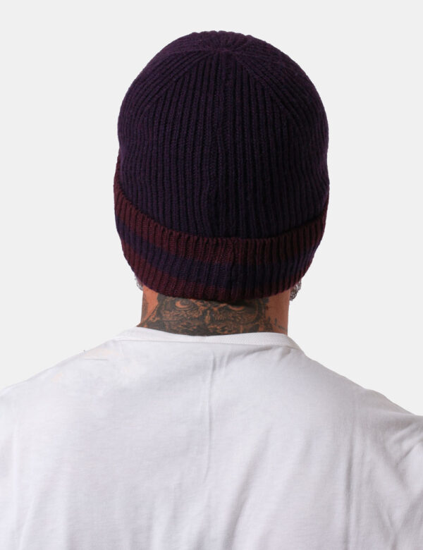 Cappello Blauer Viola - Cappello modello berretto in fantasia rigata marrone e viola prugna con risvoltino e patch nero logo