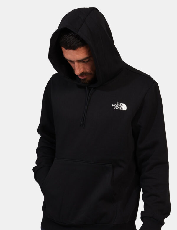 Felpa The North Face Nero - Felpa con cappuccio in total nero con logo brand bianco ad altezza cuore. Presente tascone a can