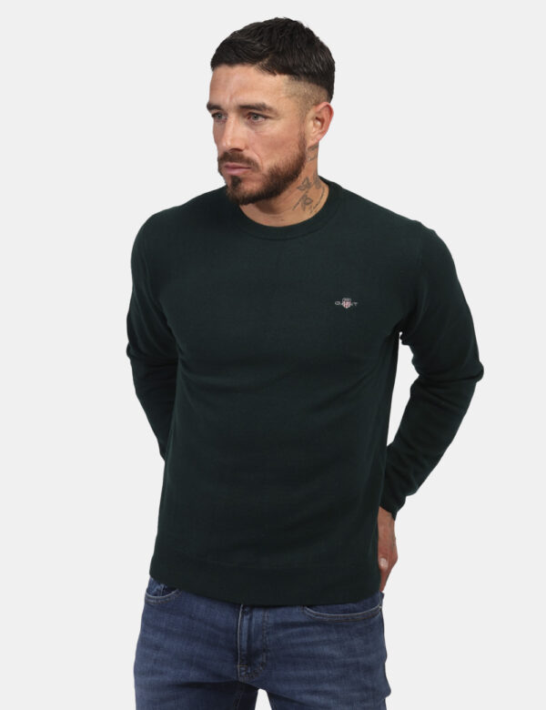 Maglione Gant Verde - Maglione con girocollo classico in total verde scuro con piccolo logo ad altezza cuore. La vestibilità