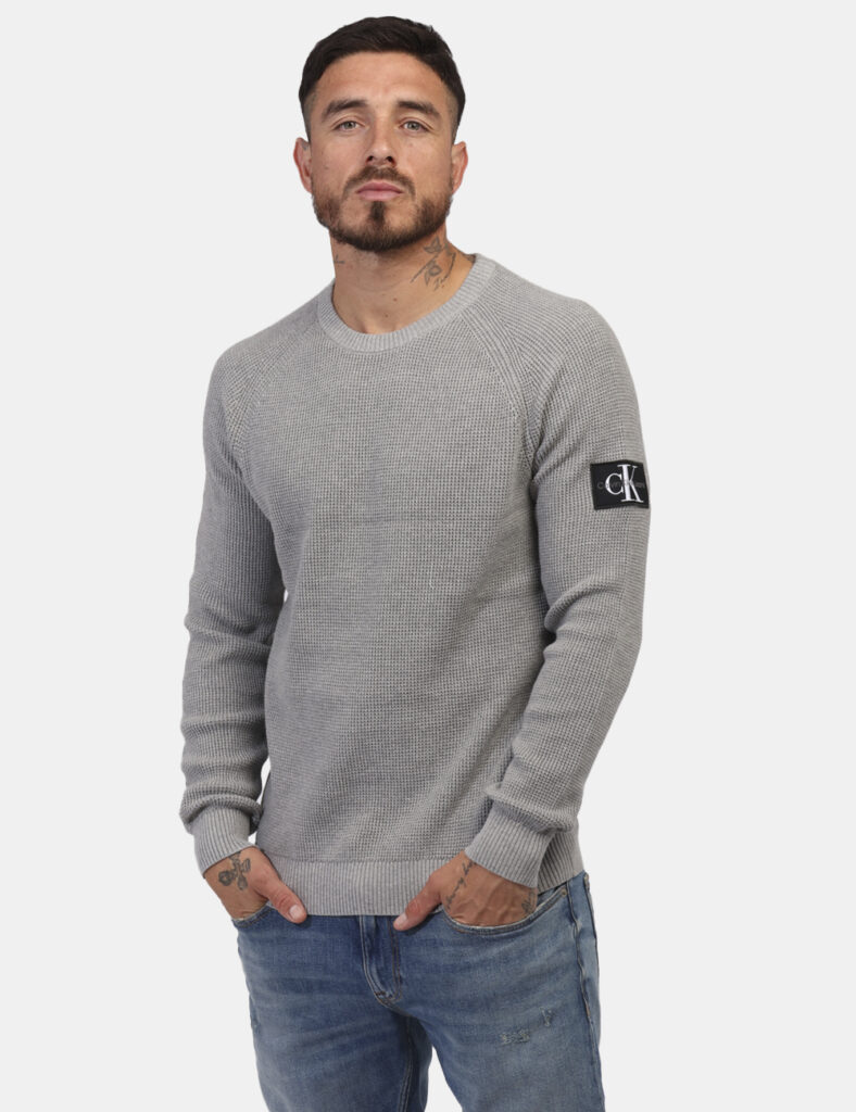 Maglione Calvin Klein Grigio - Maglione in total grigio ed in cotone. La vestibilità è morbida e regolare. Il maglione è ada