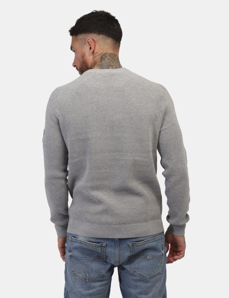 Maglione Calvin Klein Grigio - Maglione in total grigio ed in cotone. La vestibilità è morbida e regolare. Il maglione è ada