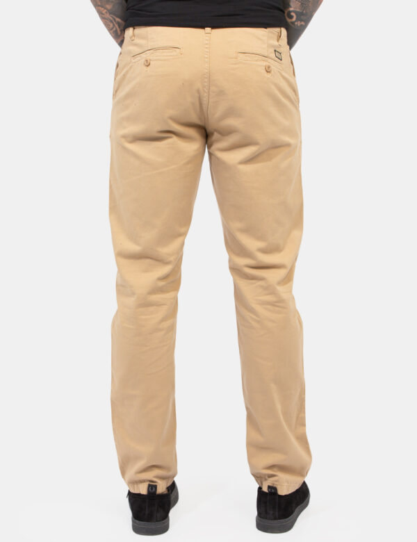 Pantaloni Guess Beige - Pantaloni simil jeans in total beige con tasche sagomate sul fronte e tasche a taglio sul retro con